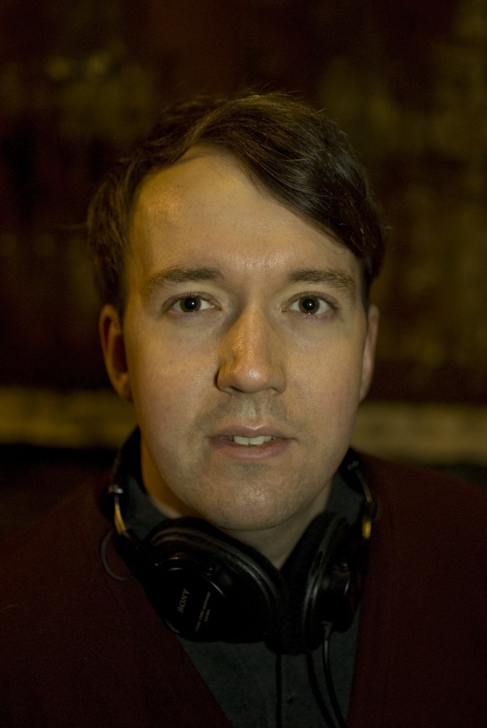 James Bull, wearing a pair of headphones